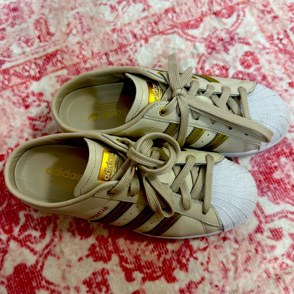 slip-on sneakers in a gorgeous brown, gold metallic and white colorway.